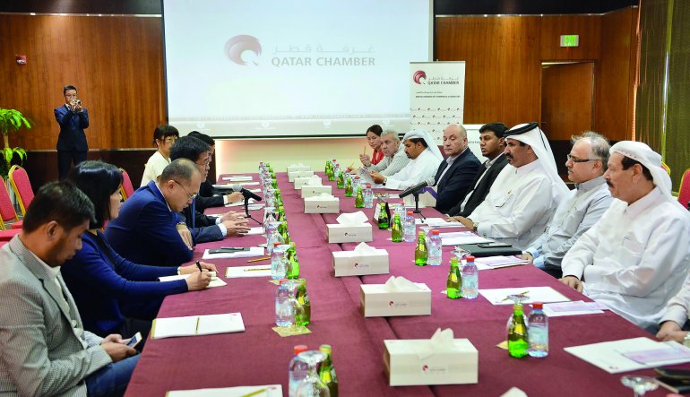 Mohamed bin Ahmed bin Towar Al Kuwari (third left), QC Vice-Chairman, and other Qatari prominent businessmen meeting with the members of Chinese trade delegation at QC headquarters