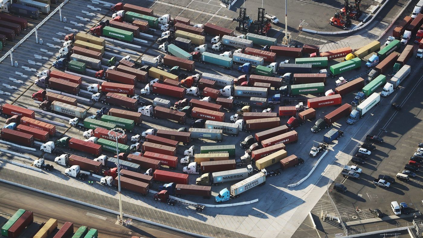 Trucks with shipping containers at the Port of Los Angeles