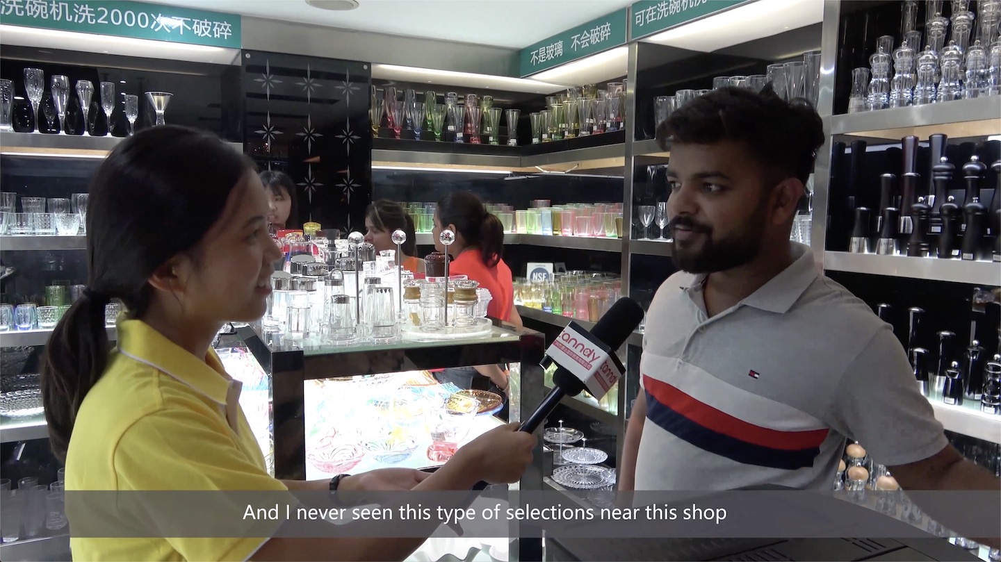 A foreign buyer says the shop has a big selection A foreign buyer says the shop has a big selection