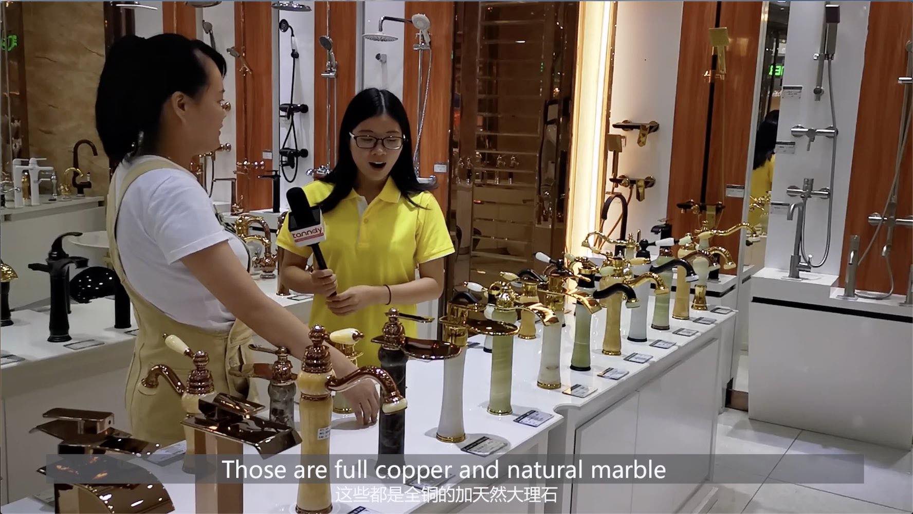 checking marble water tap in a sanitary showroom