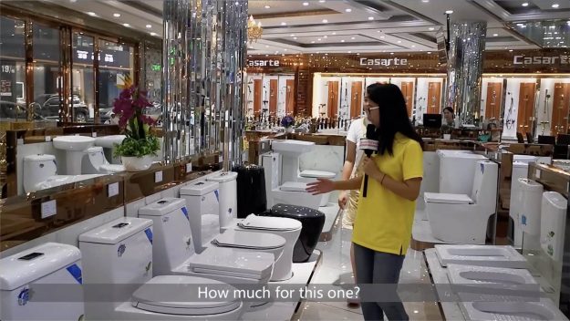 checking toilet in a showroom in sanitary market checking toilet in a showroom in sanitary market