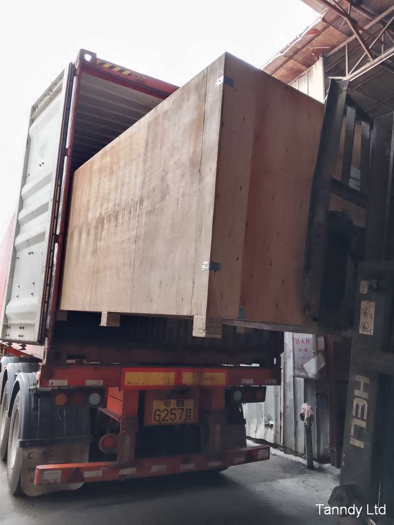 Forklift will push the box inside the container Forklift will push the box inside the container